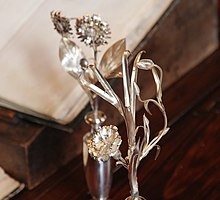 Stříbrá květina pro vítěze literární soutěže Jeux floraux (Touluse)