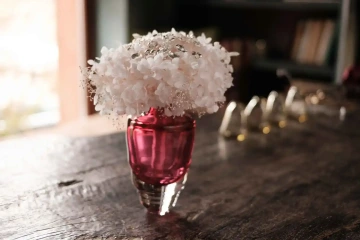 Bouquet of silver adn white flowers in a vase for holidays and celebrations