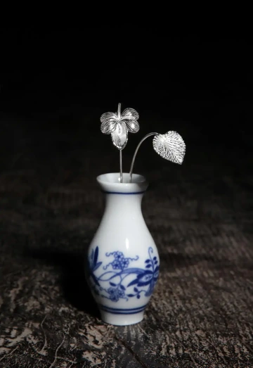 Silver violet, in a white vase. Mother’s Day gift