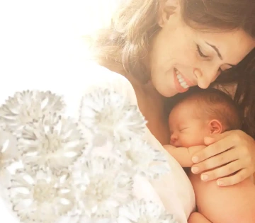 Woman holdig a new born