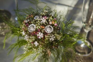 Luxury wedding decoration made of silver and fresh flowers