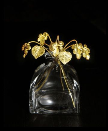 Golden violets in a vase