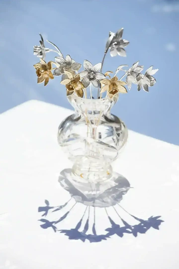 Jewellery bouquet of Nine Daffodils in silver and gold in a vase