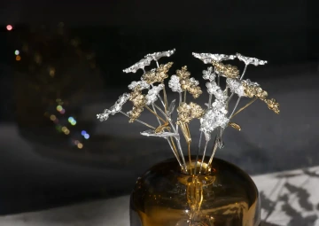 Forget-me-nots of silver and gold for a wedding bouquet