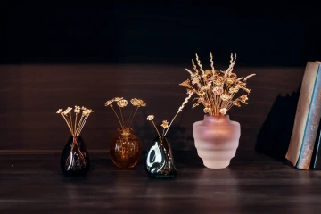 Four vases with different numbers of golden flowers, romantic gift for woman, man, both