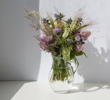 Glass vase with local, meadow flowers