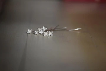 Silver lilacs lying on the table, a gift for mom on her birthday