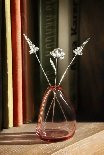 Bouquet of silver flowers in a vase for a work anniversary