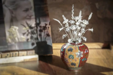 Bouquet of 30 flowers made of silver in a vase after 30 years of romantic gifts