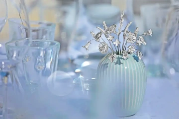 Silver flowers in wedding vase for decoration of luxury wedding