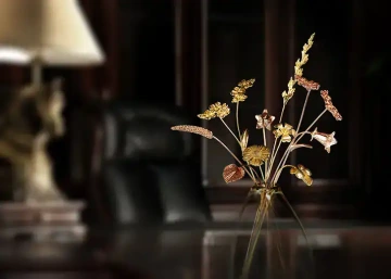 A bouquet of flowers of gold in a vase by GIYOU, jewellery Prague