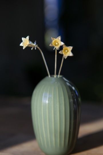 Golden bellflowers of newlyweds in a vase